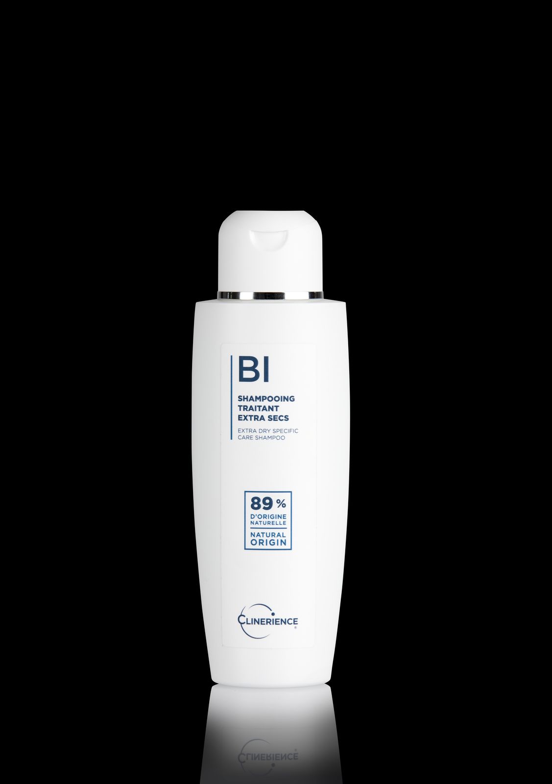 a bottle of lotion on a black background