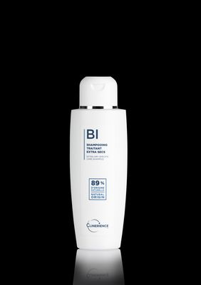 a bottle of lotion on a black background