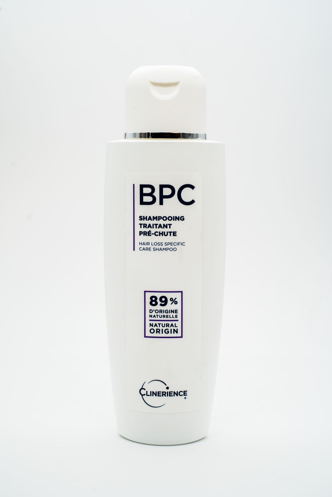 a bottle of bbc shampoo on a white background
