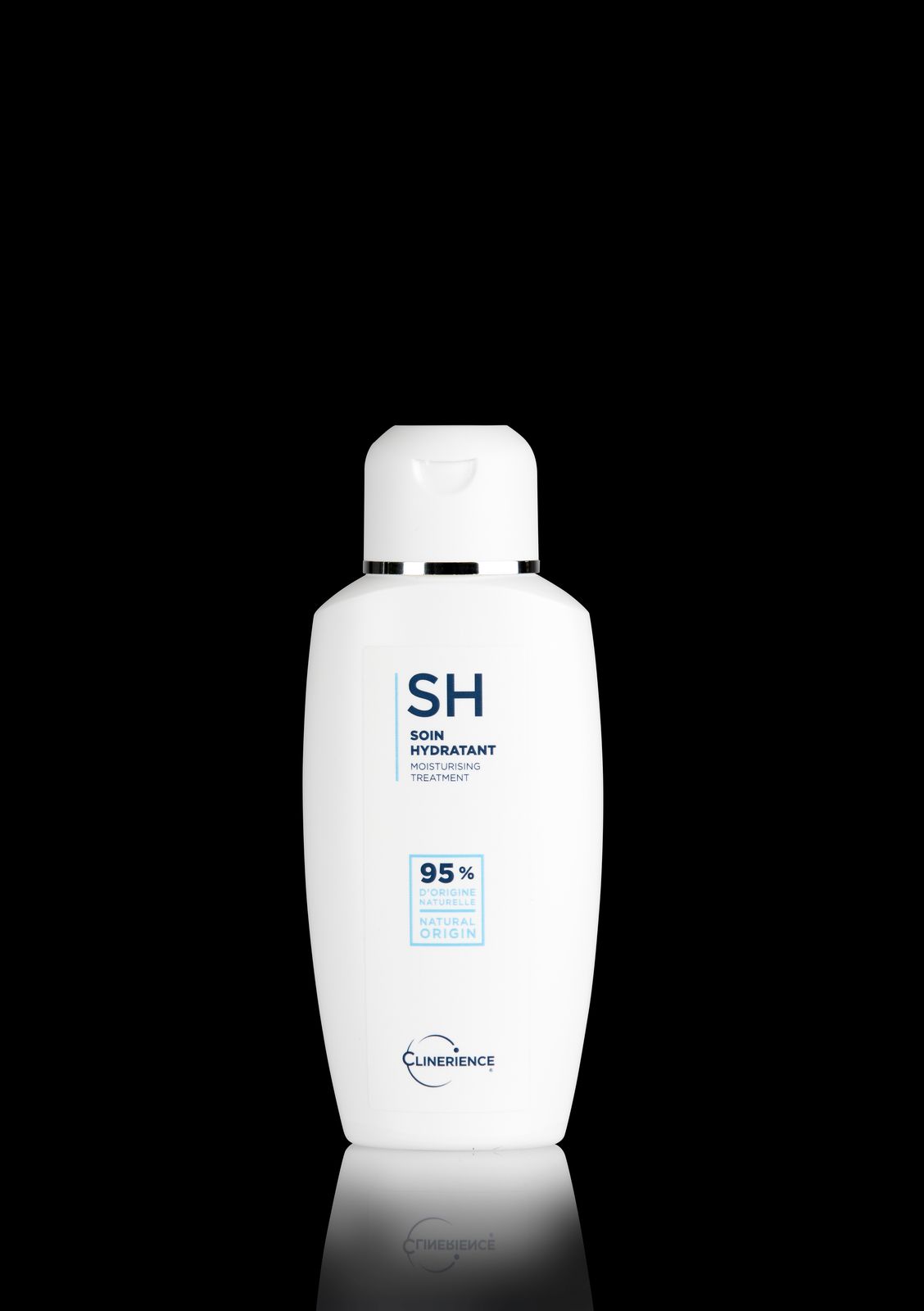 a bottle of shampoo on a black background