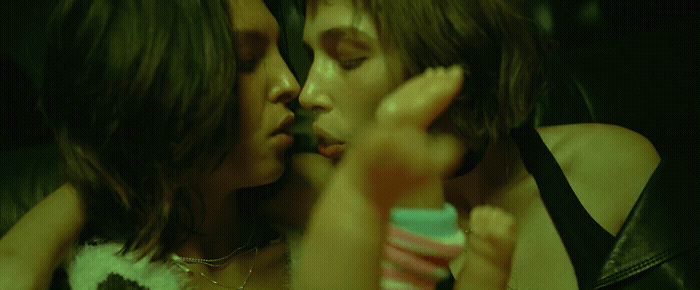 a couple of people that are kissing each other