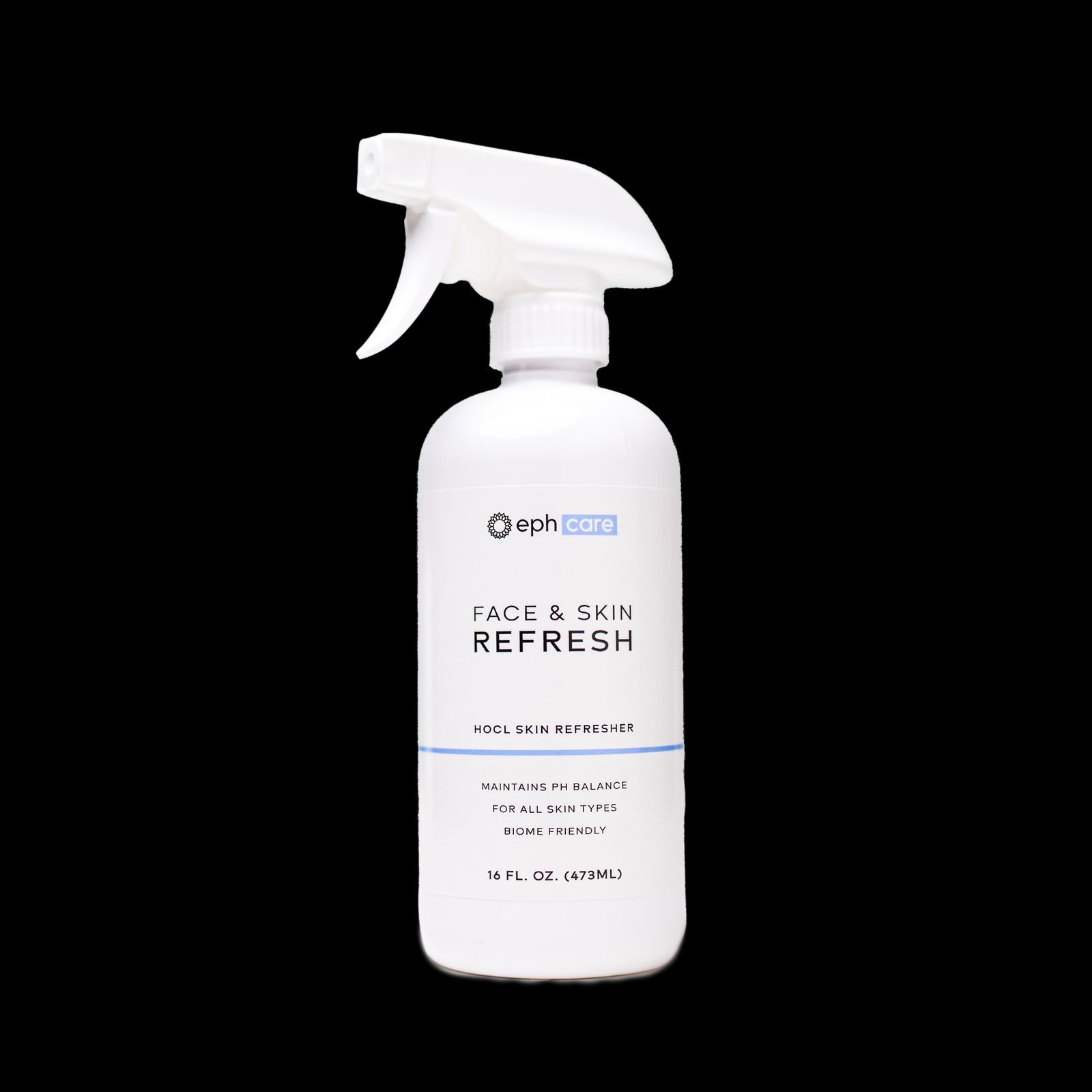 a bottle of face and skin refresh on a black background