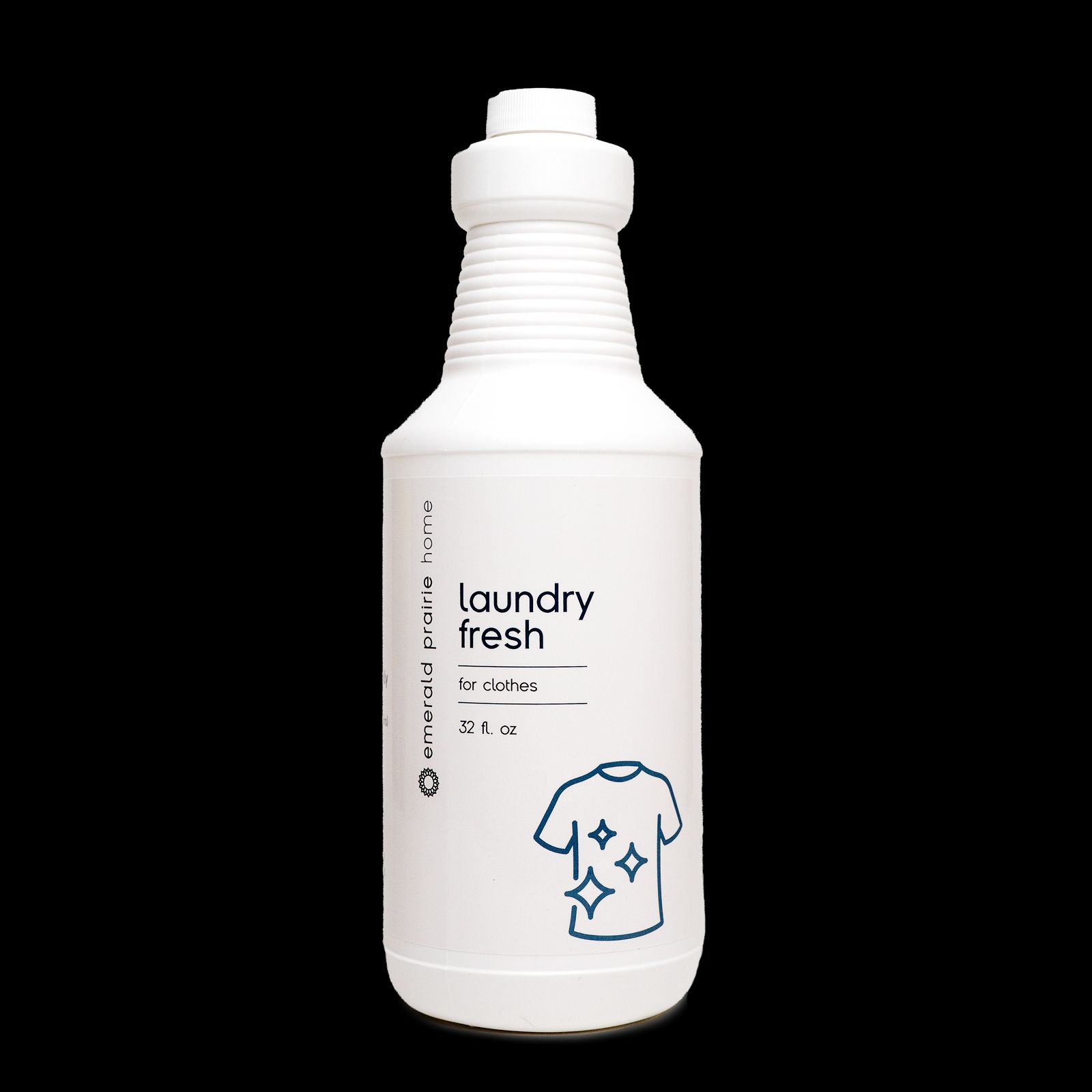 a bottle of laundry freshener on a black background