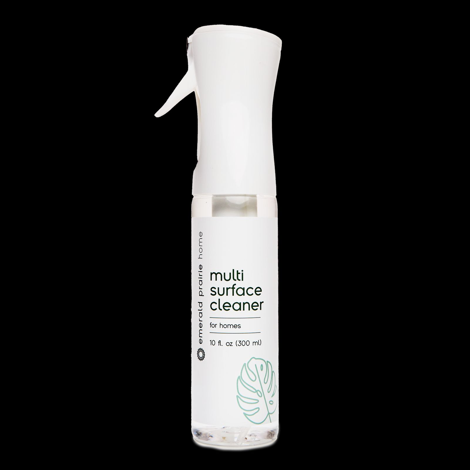 a bottle of multi surface cleaner on a black background