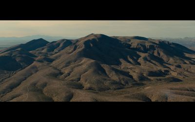 an aerial view of a mountain range in the desert