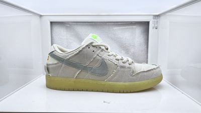 a pair of nike sneakers in a display case