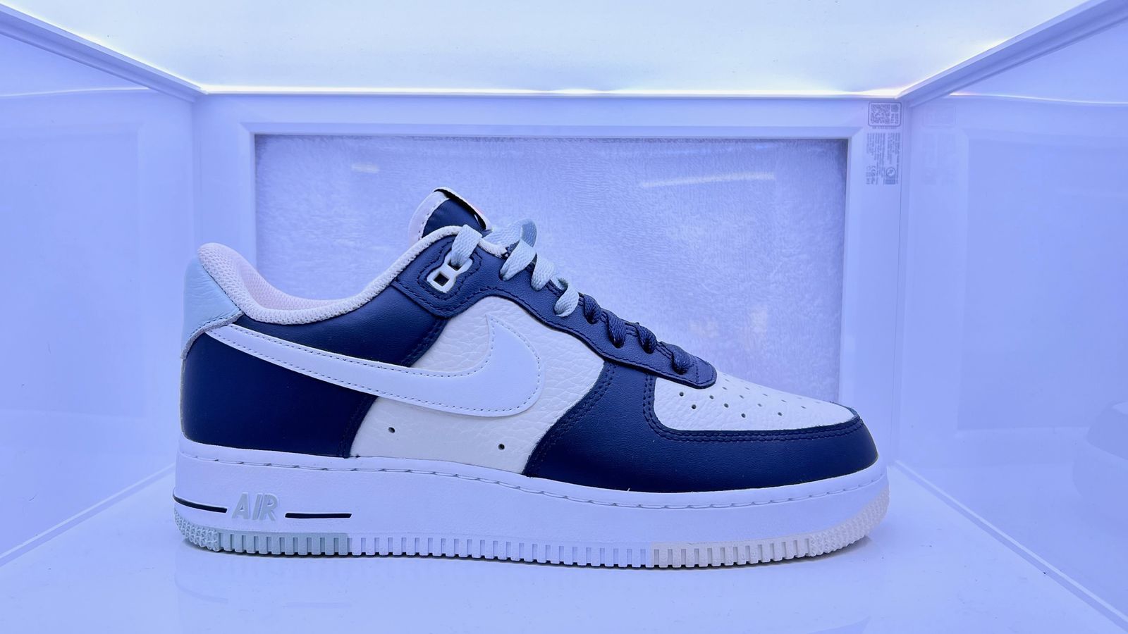 a blue and white nike air force sneakers