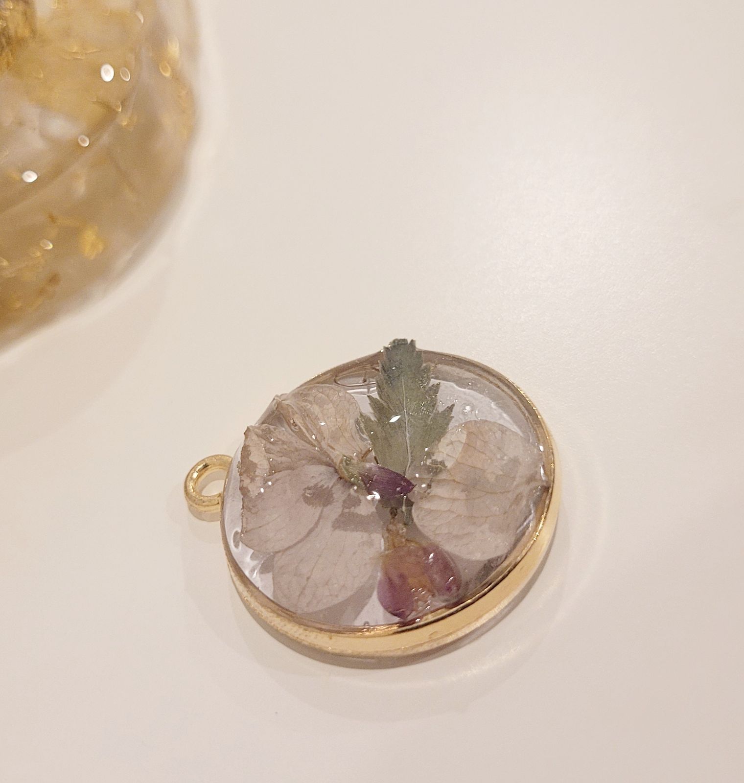 a close up of a flower in a glass vase