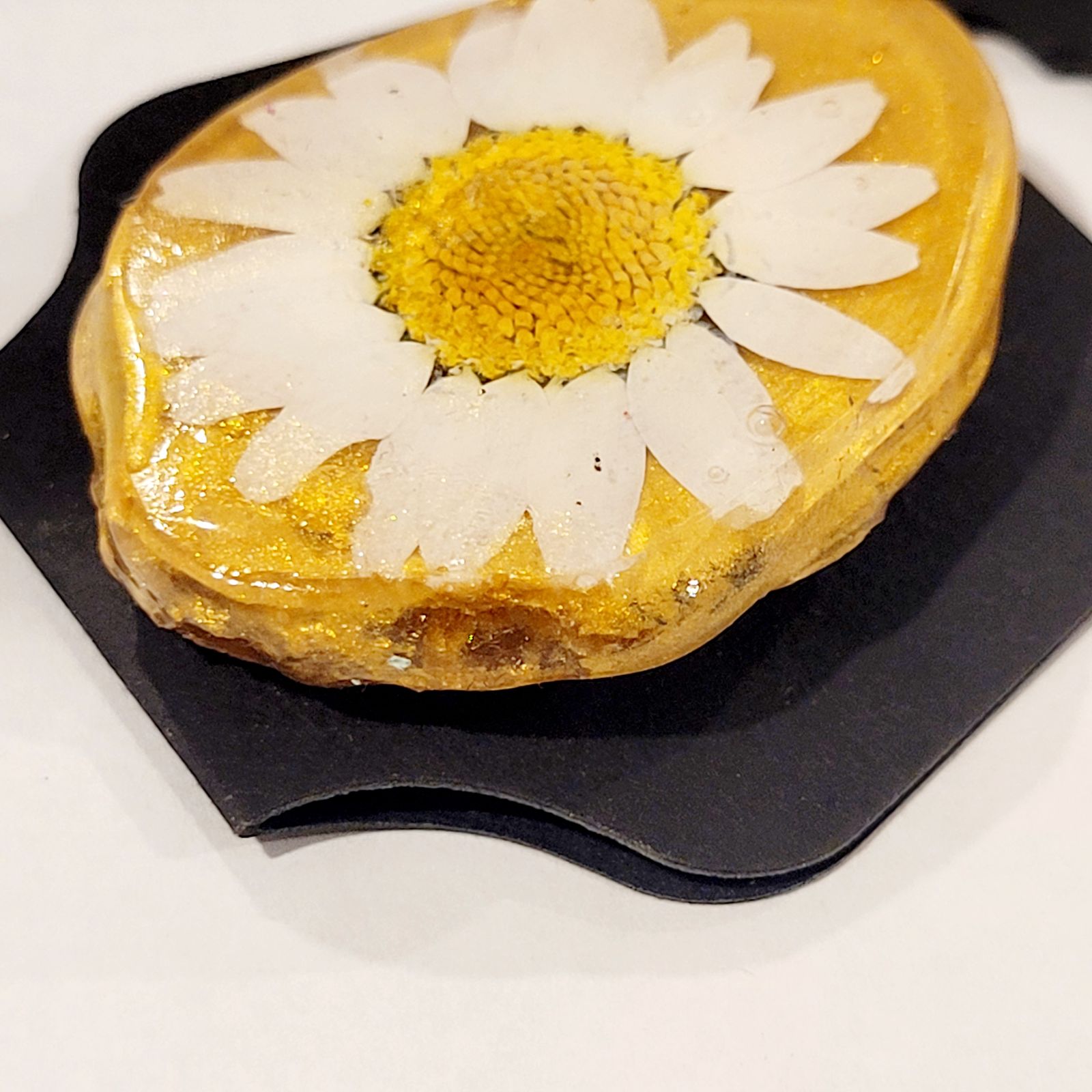 a cake with a flower on top of it