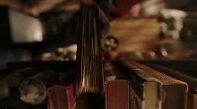 a stack of books sitting on top of a table