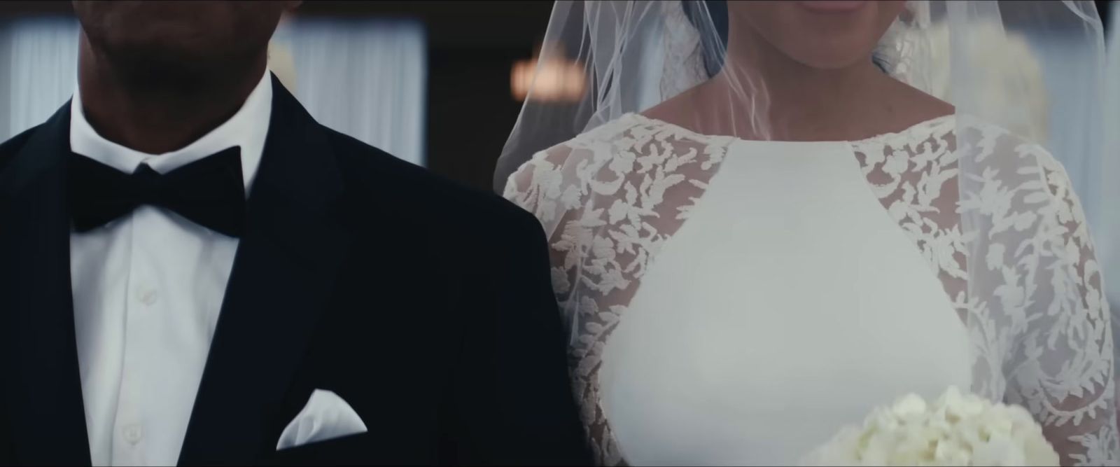 a man in a tuxedo and a woman in a wedding dress