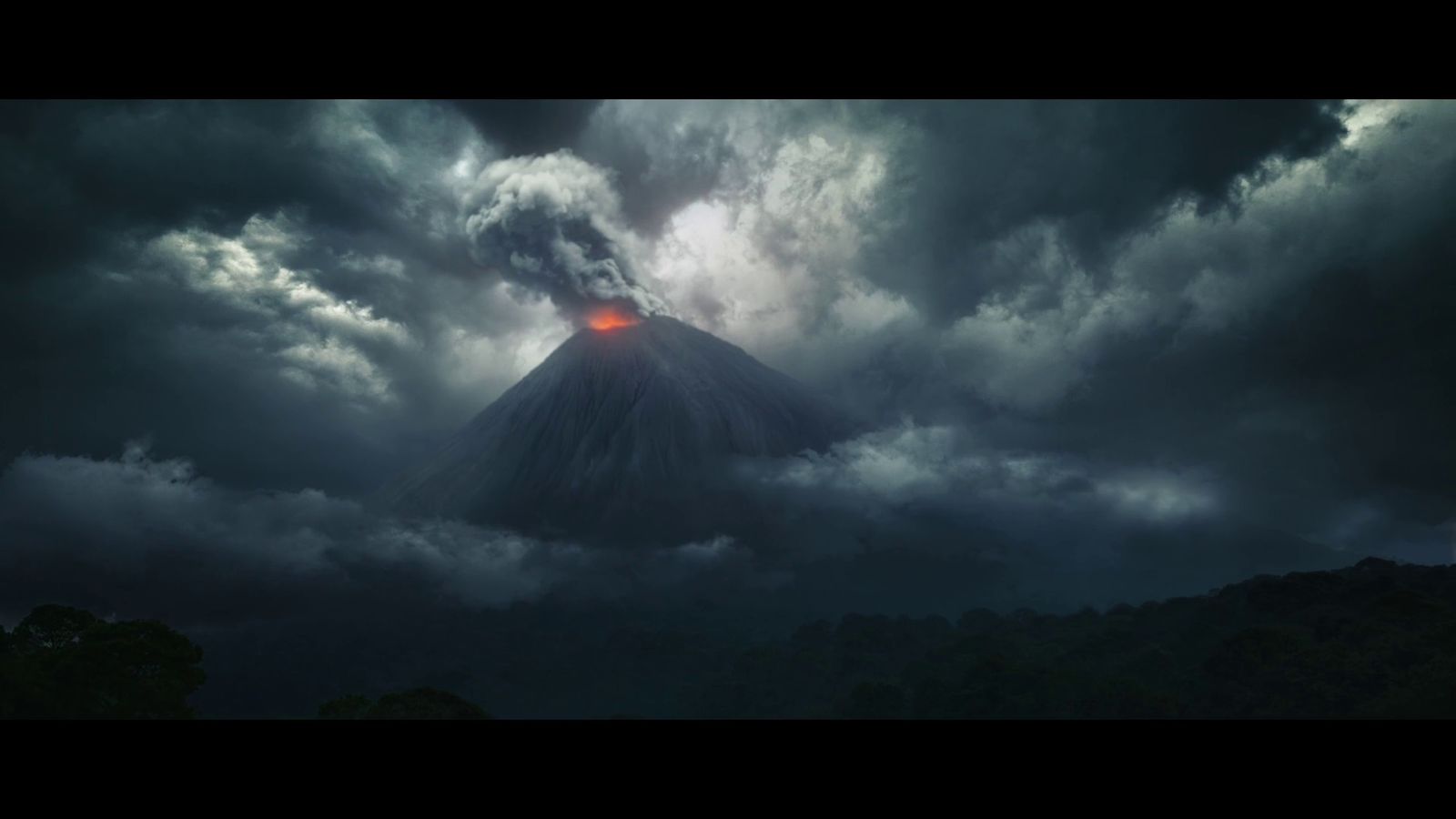 a volcano in the middle of a cloudy sky