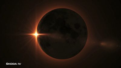 a solar eclipse is seen in the dark sky