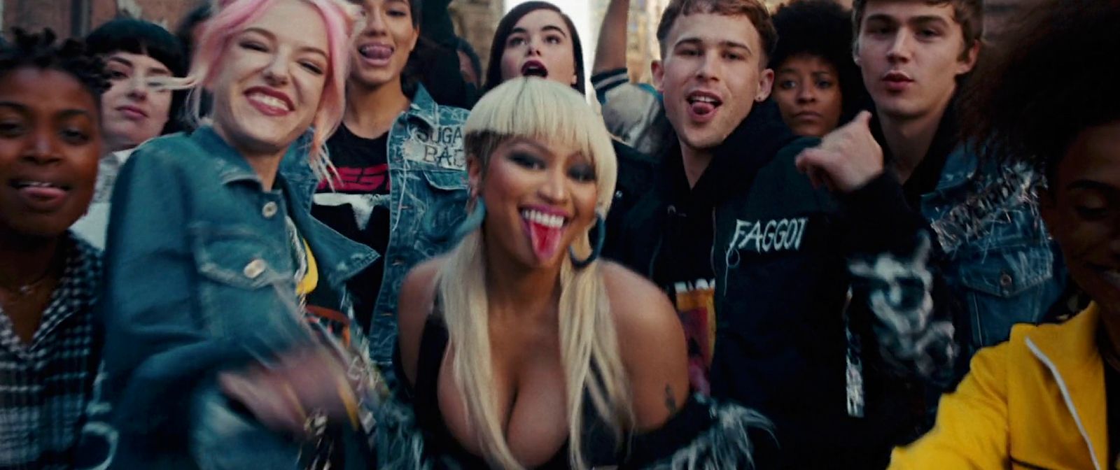 a group of people standing next to each other