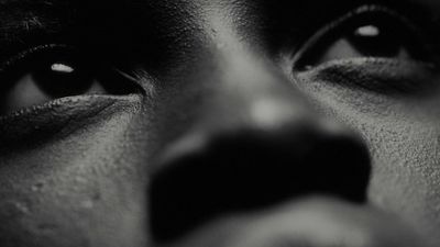 a black and white photo of a woman's face