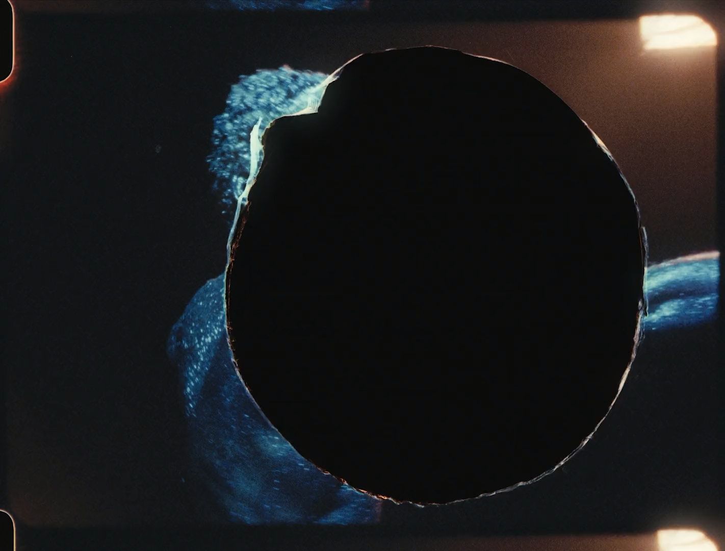 a circular object is shown in the dark