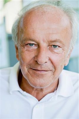 a close up of a person wearing a white shirt