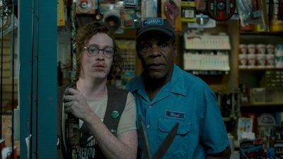 a man standing next to a woman in a store
