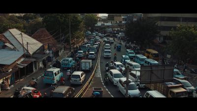 a city street filled with lots of traffic