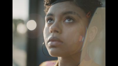 a close up of a person wearing ear buds