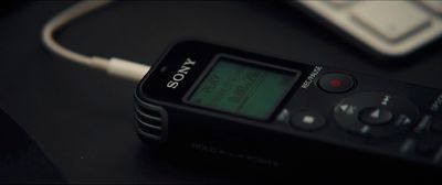 a close up of a cell phone on a table