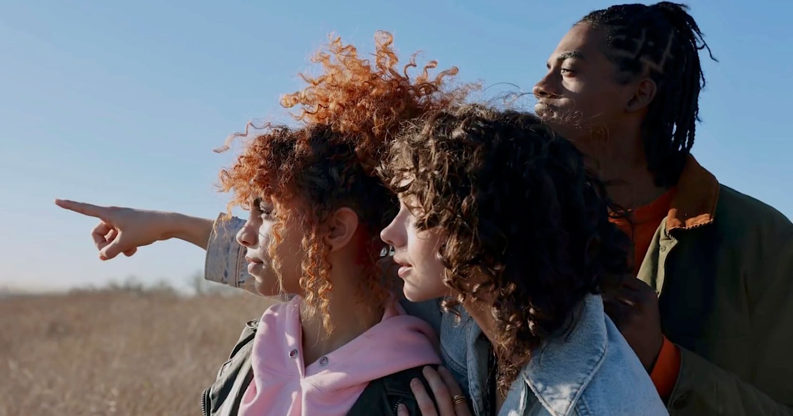 a group of young women standing next to each other