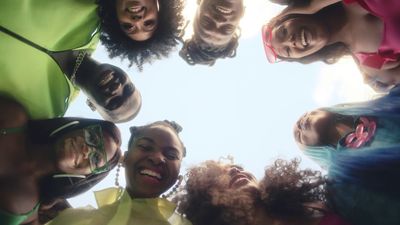 a group of people standing in a circle