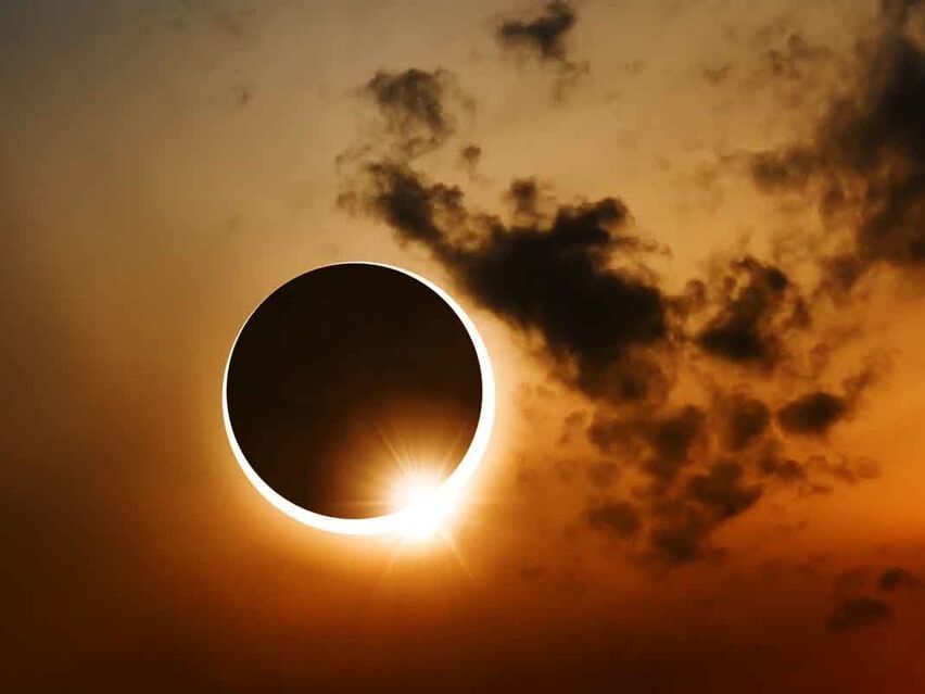 a solar eclipse is seen in the sky