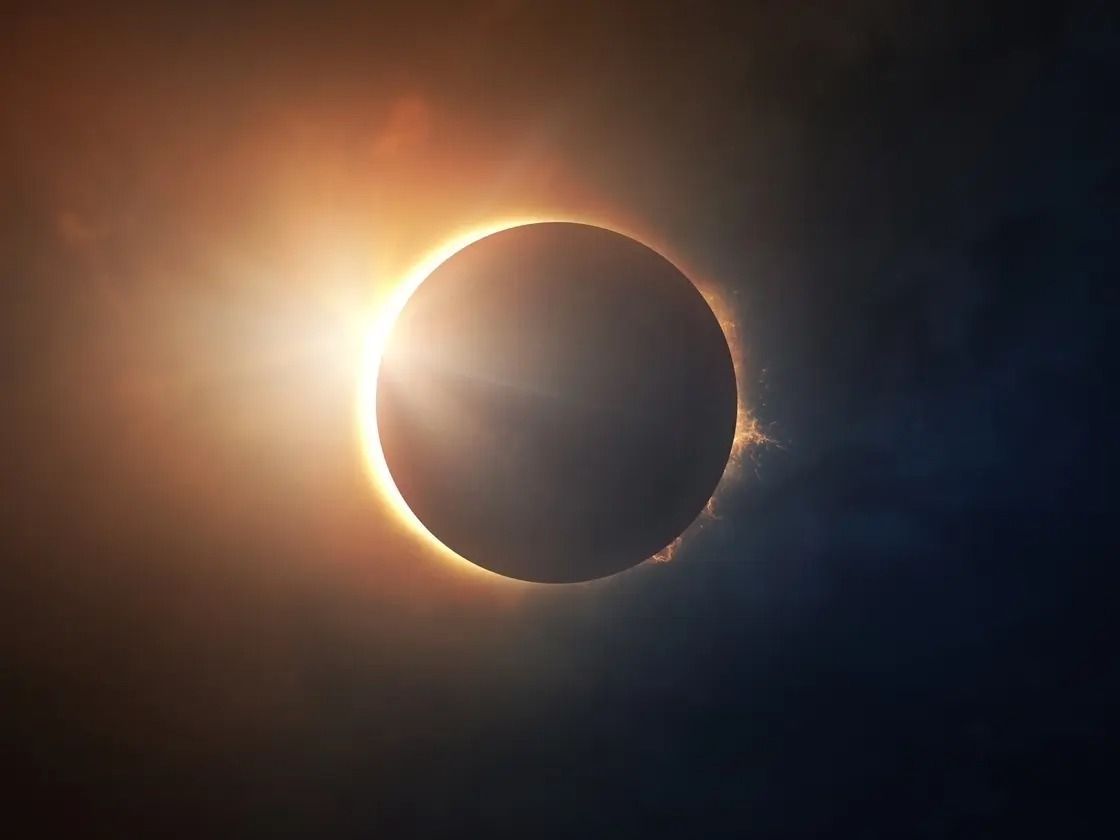 a solar eclipse is seen in the sky