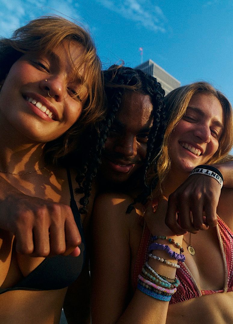 a group of young women standing next to each other