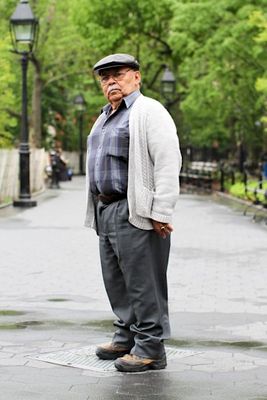 a man standing in the middle of a street