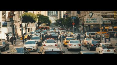 a busy city street filled with lots of traffic