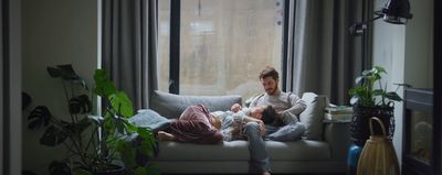 a man and a woman sitting on a couch