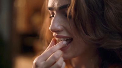 a close up of a person brushing their teeth