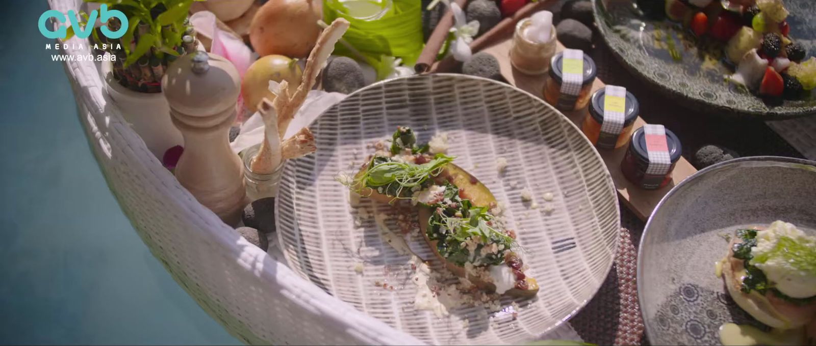 a table topped with plates of food covered in toppings