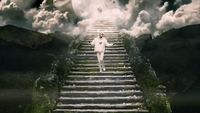 a man walking down a flight of stairs in the sky