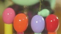 a close up of a bunch of colorful candy lollipops