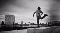 a man is doing a trick on a skateboard