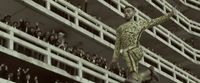 a man in a leopard print suit jumping in the air