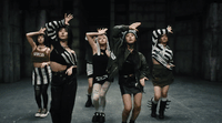 a group of young women standing next to each other