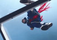 a person in a skydiver doing a trick in the air