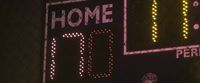 a close up of a score board at a baseball game