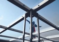 a person is standing on a metal structure