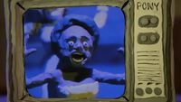 a picture of a creepy clown on a tv screen