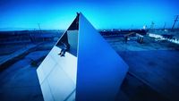 a person climbing up the side of a building