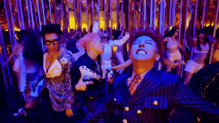 a group of people standing next to each other