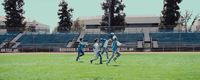 a group of young men playing a game of soccer