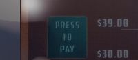 a sign that says press to pay on it