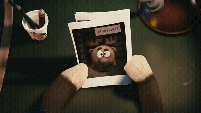 a person holding up a picture of a monkey