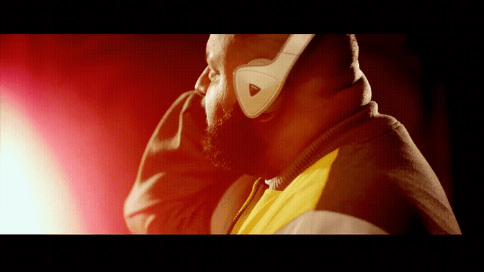 a man with headphones on his ears